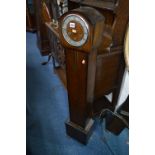 AN OAK GRANDDAUGHTER CLOCK, (battery movement, but original movement included) (losses)