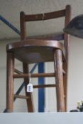 A PAINTED WOODEN CHILD'S CHAIR