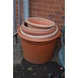 FIVE PLASTIC PLANTERS