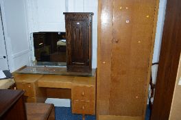 A LIGHT OAK SINGLE DOOR WARDROBE, and a matching dressing table with single mirror (2)