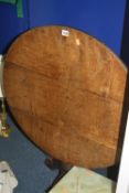 A GEORGIAN CIRCULAR OAK TRIPOD TABLE, with separate glass top and brass occasional table (2)