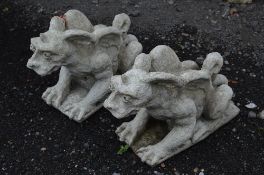 A PAIR OF PRE CAST GARDEN MYTHICAL CREATURES