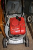 A HONDA HR1950 PETROL SELF PROPELLED LAWNMOWER, with grass box (s.d, unsure of working order)