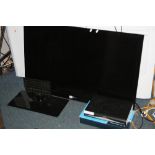 AN LG 47' LED TV, with boxed wall mount and a Sky + box (two remotes)