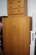 AN OAK G PLAN BRANDON TWO DOOR WARDROBE, and chest of five long drawers (key) (2)