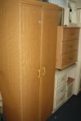 A MODERN TWO DOOR WARDROBE, and a chest of three drawers (2)