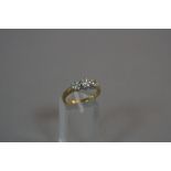 AN 18CT DIAMOND FLOWER SET RING, ring size P, approximate weight 4.2 grams