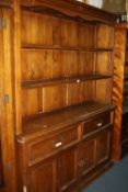 A LARGE PINE KITCHEN DRESSER, with two drawers, approximate size width 160cm x height 203cm x