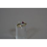 A 9CT RUBY AND DIAMOND RING, ring size Q1/2, approximate weight 3.0 grams