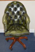 A GREEN LEATHER BUTTONED STUDY SWIVEL CHAIR, approximate size height 101cm x front inner arm width