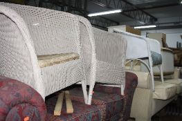 A PAIR OF LLOYD LOOM BEDROOM CHAIRS, another bedroom chair and an ottoman (4)