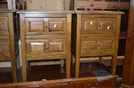 A PAIR OF HARDWOOD TWO DRAWER BEDSIDE CABINETS