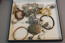A TRAY OF SILVER AND COSTUME JEWELLERY