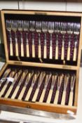 A MAHOGANY BOXED SET OF TWELVE KNIVES AND FORKS, and three other flatware boxed items