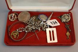 A TRAY, to include a silver chain, mother of pearl buckle, badges, etc