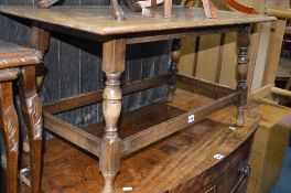 AN OAK COFFEE TABLE, two wine tables, and a childs stool (sd) (4)