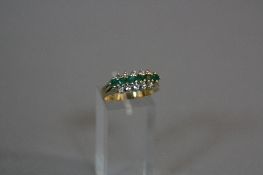 A 14CT EMERALD AND DIAMOND RING, ring size R, approximate weight 4.6 grams