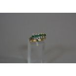 A 14CT EMERALD AND DIAMOND RING, ring size R, approximate weight 4.6 grams