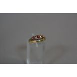 A VICTORIAN RUBY AND DIAMOND GYPSY RING, Birmingham 1898, ring size Q, approximate weight 3.0 grams