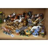 TWENTY FOUR JEWELLED METAL/ENAMEL ANIMAL BOXES, to include horses, peacock, tiger, eagles, other