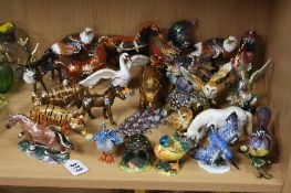 TWENTY FOUR JEWELLED METAL/ENAMEL ANIMAL BOXES, to include horses, peacock, tiger, eagles, other