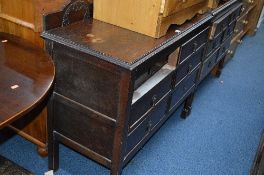 AN OAK DRESSING TABLE, with single mirror and a matching chest of three drawers (2)
