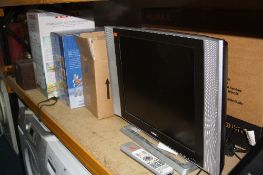 A HUMAX 20' LCD TV (remote) and three boxed kitchen electrical items (4)