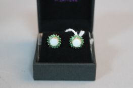 A PAIR OF 9CT OPAL AND EMERALD CLUSTER EARRINGS