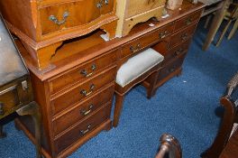 A YEW WOOD BRADLEY DRESSING TABLE, with nine drawers, approximate size width 156cm x depth 47cm x