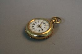 A 9CT GOLD LADIES FOB WATCH, approximate weight 23.4 grams