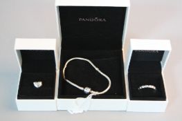A PANDORA BRACELET, A RING AND A CHARM, all boxed (3)