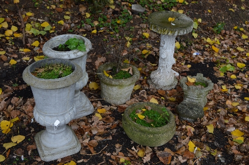 A PRE-CAST BIRD BATH, on seperate base and three various garden planters, together with a pair of