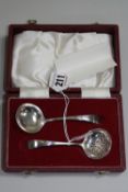 A BOXED TWO SET SILVER SPOONS