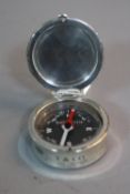 A COMPASS IN A SILVER CASE, by Tiffany inscribed '2001 Tiffany & Co Spain 925'