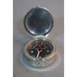 A COMPASS IN A SILVER CASE, by Tiffany inscribed '2001 Tiffany & Co Spain 925'