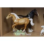 A BESWICK GALLOPING HORSE, No.1374 PALOMINO, (chip to ear), together with Shire Mare No.818,