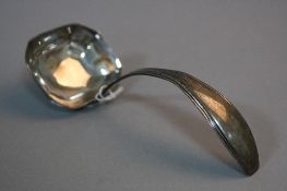 A SILVER LADLE, and a silver crown (2)