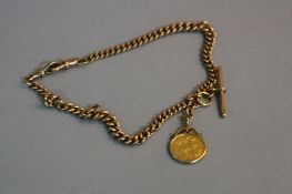 A 1911 SOVEREIGN ON A 9CT MOUNT, and a 9ct T bar chain, approximate total weight 59.4 grams