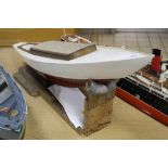 A PART COMPLETED MYSTERY 18M POND YACHT, of wooden construction, with a set of drawings and a