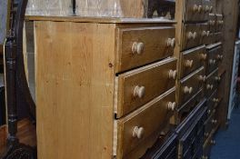 A PINE CHEST, of two short and three long drawers and a matching pine chest of three long drawers (