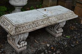 A PAINTED PRE-CAST GARDEN BENCH ON SEPERATE LEGS, approximate length 132cm (sd)