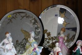 A PAIR OF CIRCULAR MIRRORS, with gilt birds and foliage and peacock and foliage decorations,