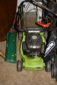 A PERFORMANCE PETROL LAWN MOWER, with grass box and a Qualcast Turbovac 1100 garden vac (2)