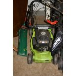 A PERFORMANCE PETROL LAWN MOWER, with grass box and a Qualcast Turbovac 1100 garden vac (2)