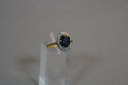 AN 18CT SAPPHIRE AND DIAMOND RING, size ring L, approximate weight 3.7 grams