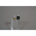 AN 18CT SAPPHIRE AND DIAMOND RING, size ring L, approximate weight 3.7 grams
