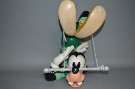 A WALT DISNEY GOOFY RESIN TRAPEZE HANGING FIGURE, complete with trapeze, figure hangs from trapeze