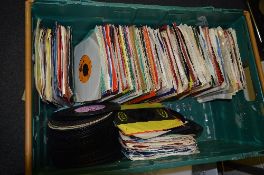 A TRAY OF OVER 200 7'' SINGLES, artists include The Rolling Stones, The Jacksons, The Sweet, etc