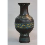 A LATE 19TH/EARLY 20TH CENTURY ORIENTAL CHAMPLEVE ENAMEL AND BRONZE VASE, bears marks to the