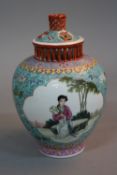 A CHINESE REPUBLIC PERIOD PORCELAIN VASE AND COVER, pierced finial and lid, the vase with pierced